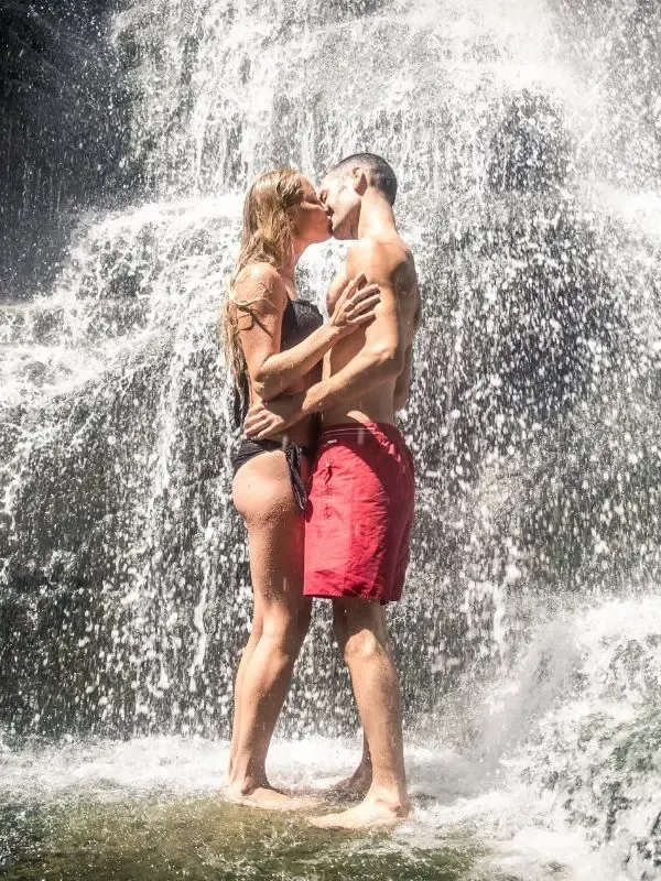 kissing at a waterfall